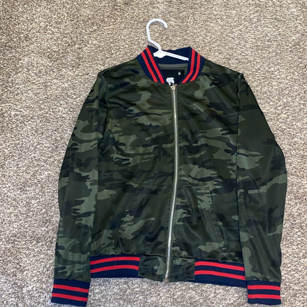 Light weight camo print jacket, lightly worn, no stains, no loose threads
